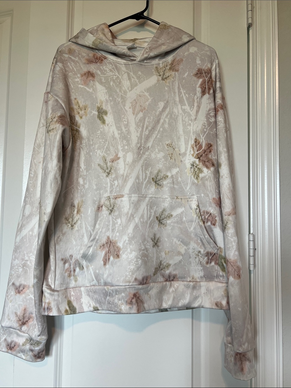 Subtle Floral Hooded Sweatshirt in Soft Neutral Tones